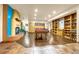 Spacious basement with beautiful floors, a fireplace, and a pool table at 17995 Minglewood Trl, Monument, CO 80132