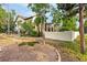 Exterior view of home with a well-manicured lawn and mature trees offering privacy at 17995 Minglewood Trl, Monument, CO 80132