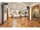 Bright exercise room with tile floors, fitness equipment, and access to the outdoors at 17995 Minglewood Trl, Monument, CO 80132