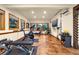 Spacious gym featuring workout equipment and multiple windows for natural light at 17995 Minglewood Trl, Monument, CO 80132