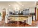 Bright kitchen with a large island and updated stainless steel appliances at 17995 Minglewood Trl, Monument, CO 80132
