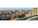 Enjoy the expansive city views from the balcony, showcasing the neighborhood's charm and vibrant atmosphere at 601 W 11Th Ave # 910, Denver, CO 80204