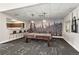 Game room features a pool table, bar area, and scenic wall mural at 601 W 11Th Ave # 910, Denver, CO 80204