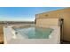 Relaxing hot tub with jets on a spacious patio, providing a serene retreat with city views at 601 W 11Th Ave # 910, Denver, CO 80204