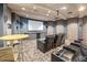 Enjoy movie nights in this cozy theater room with comfortable seating and a large screen at 601 W 11Th Ave # 910, Denver, CO 80204