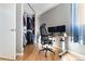 Office with a large closet and dual monitors for a productive workspace at 601 W 11Th Ave # 910, Denver, CO 80204
