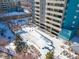 Aerial view of community pool covered in snow at 601 W 11Th Ave # 910, Denver, CO 80204