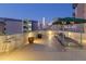 Relax on the rooftop deck with lounge seating, tables, chairs, and a great city view at 601 W 11Th Ave # 910, Denver, CO 80204