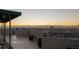 Gorgeous rooftop view with desert landscape and setting sun at 601 W 11Th Ave # 910, Denver, CO 80204