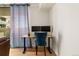 A functional workspace features a modern desk, comfortable seating, and dual monitors for productivity at 601 W 11Th Ave # 910, Denver, CO 80204