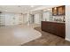 Spacious finished basement offering a bar area and plenty of versatile living space at 5523 E Utah Pl, Denver, CO 80222