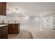 Basement features a bar, shelving, and ample open space at 5523 E Utah Pl, Denver, CO 80222