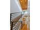 Contemporary staircase design with metal railings and wooden accents, leading to upper floors at 3227 Quivas St # 1, Denver, CO 80211