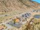 Overhead shot of condos near a river, highway, and picturesque mountains at 1890 Argentine St # D203, Georgetown, CO 80444