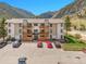 Attractive multi-unit complex with manicured landscaping, ample parking, and mountain views at 1890 Argentine St # D203, Georgetown, CO 80444