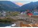 Scenic view of houses and a lake at the foot of mountains at 1890 Argentine St # D203, Georgetown, CO 80444
