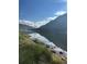 Calm lake scene with mountain reflecting in the water at 1890 Argentine St # D203, Georgetown, CO 80444