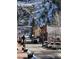 Scenic street view of a charming mountain town in the winter with snow on the mountain at 1890 Argentine St # D203, Georgetown, CO 80444