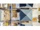 Overhead view of the property showing the roof, backyard with trampoline, patio, and landscaping at 5318 Truckee St, Denver, CO 80249