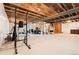 Spacious unfinished basement with natural light, a blank canvas ready for your design ideas at 5318 Truckee St, Denver, CO 80249