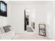 Bright bedroom boasts a view to the walk-in closet and ensuite bathroom at 5318 Truckee St, Denver, CO 80249