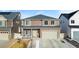 Charming two-story home with a two-car garage and welcoming front porch at 5318 Truckee St, Denver, CO 80249