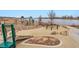 Community playground with a variety of equipment for children to enjoy at 12863 Crane River Dr, Firestone, CO 80504