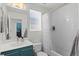 Simple bathroom with single vanity and tub shower at 17826 E 107Th Way, Commerce City, CO 80022