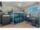 Comfortable bedroom featuring a bunk bed, a desk, and natural light from a window at 17826 E 107Th Way, Commerce City, CO 80022