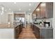 Beautiful kitchen with stainless steel appliances, granite countertops, and hardwood floors at 236 Back Nine Dr, Castle Pines, CO 80108