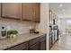 This kitchen showcases granite countertops and attractive cabinets for a modern feel at 236 Back Nine Dr, Castle Pines, CO 80108