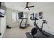 Exercise room featuring a treadmill and stationary bike, perfect for staying active at 236 Back Nine Dr, Castle Pines, CO 80108