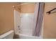 Bathroom featuring a tiled shower/tub and modern fixtures at 1772 Taos St, Brighton, CO 80603