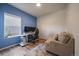 Bright office featuring new flooring, window, and calming blue accent wall at 1772 Taos St, Brighton, CO 80603