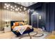 Beautiful primary bedroom with a unique light fixture and decor at 1919 W 32Nd Ave, Denver, CO 80211