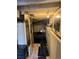 Unfinished basement space with exposed beams, concrete walls, and a simple living area at 215 Colorado Blvd, Idaho Springs, CO 80452