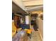Basement area with exposed pipes, vintage furniture and decor at 215 Colorado Blvd, Idaho Springs, CO 80452