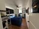 Inviting bedroom with a ceiling fan, wood floors, and a cozy bed, ideal for relaxation and rest at 215 Colorado Blvd, Idaho Springs, CO 80452