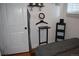 Tastefully decorated bedroom with hardwood floors and minimalist accents at 215 Colorado Blvd, Idaho Springs, CO 80452