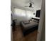Bright bedroom featuring a ceiling fan, cozy bed, and natural light through sheer curtains at 215 Colorado Blvd, Idaho Springs, CO 80452