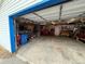 Spacious two-car garage with ample storage and workspace, perfect for projects and parking at 215 Colorado Blvd, Idaho Springs, CO 80452