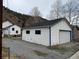Detached one car garage with blue trim, easy access, perfect for car or extra storage at 215 Colorado Blvd, Idaho Springs, CO 80452