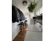 This laundry space includes storage for shoes and clothing with a large window at 215 Colorado Blvd, Idaho Springs, CO 80452