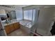 Bathroom with a soaking tub, separate shower, and double vanity sinks at 8024 W 95Th Way, Broomfield, CO 80021