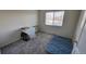 Simple bedroom with carpeted floors and a bright window with white blinds at 8024 W 95Th Way, Broomfield, CO 80021