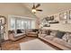 Comfortable living room with bay window and hardwood floors at 14558 Vine St, Thornton, CO 80602