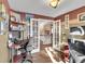 Bright, well-lit office with open French doors and hardwood floors at 14558 Vine St, Thornton, CO 80602