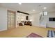 Spacious finished basement with stairs, recessed lights, and cozy seating area at 8174 Field Cir, Arvada, CO 80005