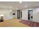 Finished basement with laundry room, stairs, and recessed lighting at 8174 Field Cir, Arvada, CO 80005