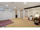 Finished basement with recessed lighting, neutral carpet, and separate room access at 8174 Field Cir, Arvada, CO 80005
